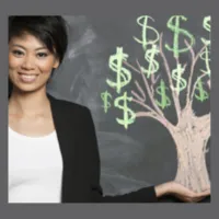 Woman holding money tree. 