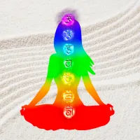 an outline image of a rainbow colored woman sitting in lotus position with chakra symbols super imposed over her vertically